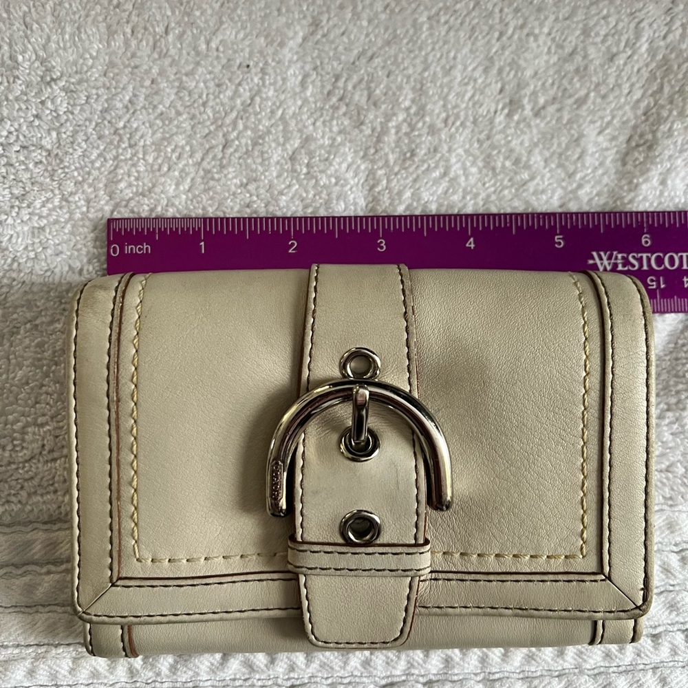 Coach trifold wallet.